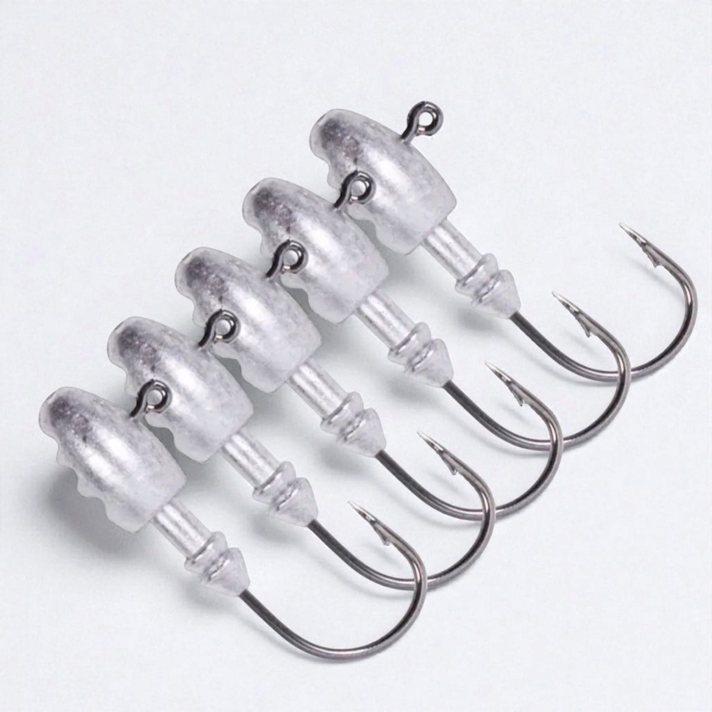 Close-up of sharp barb jig head hooks designed for soft bait โ high-strength build ideal for freshwater and saltwater fishing