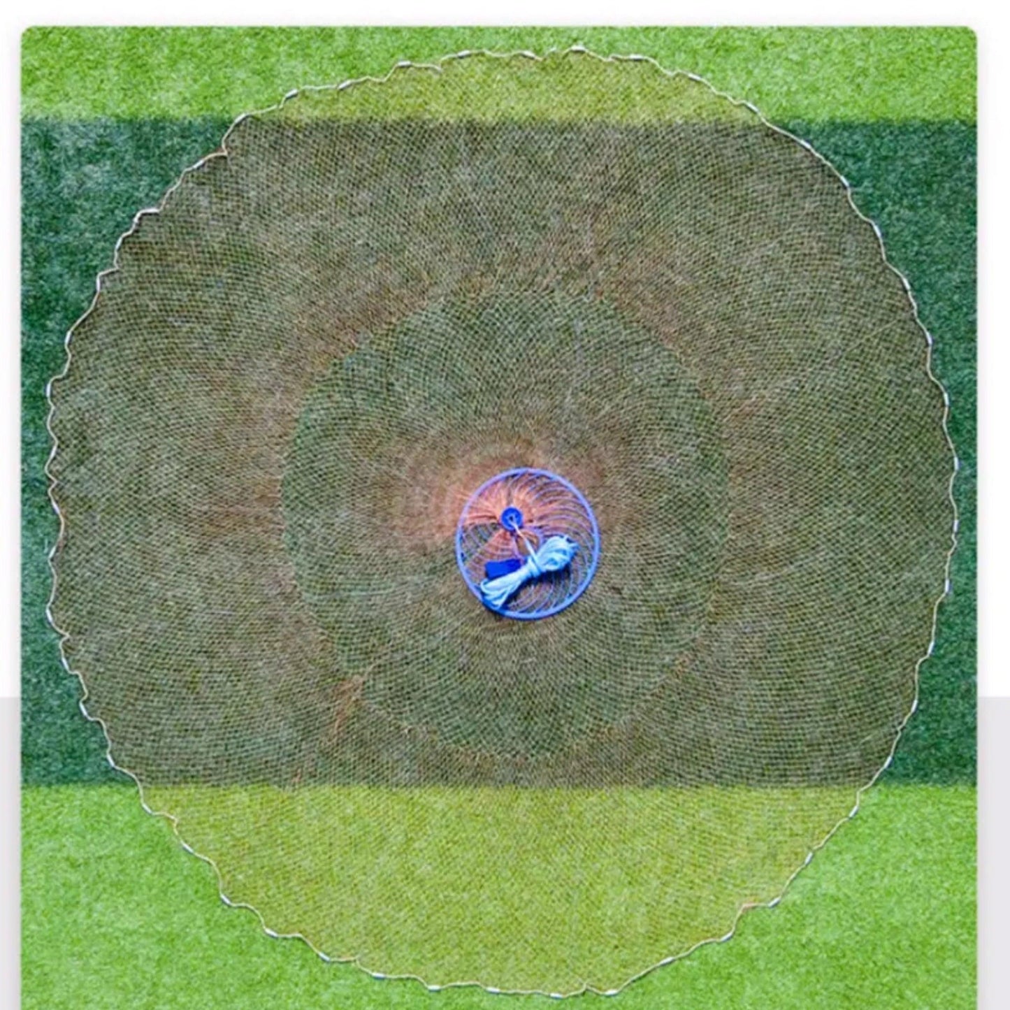 Fully spread 10ft cast net with a circular shape for maximum coverage