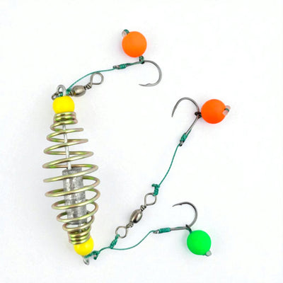 Multi-hook spring feeder rig with a durable metal coil, fishing swivels, and bright colored bait balls for effective freshwater angling.