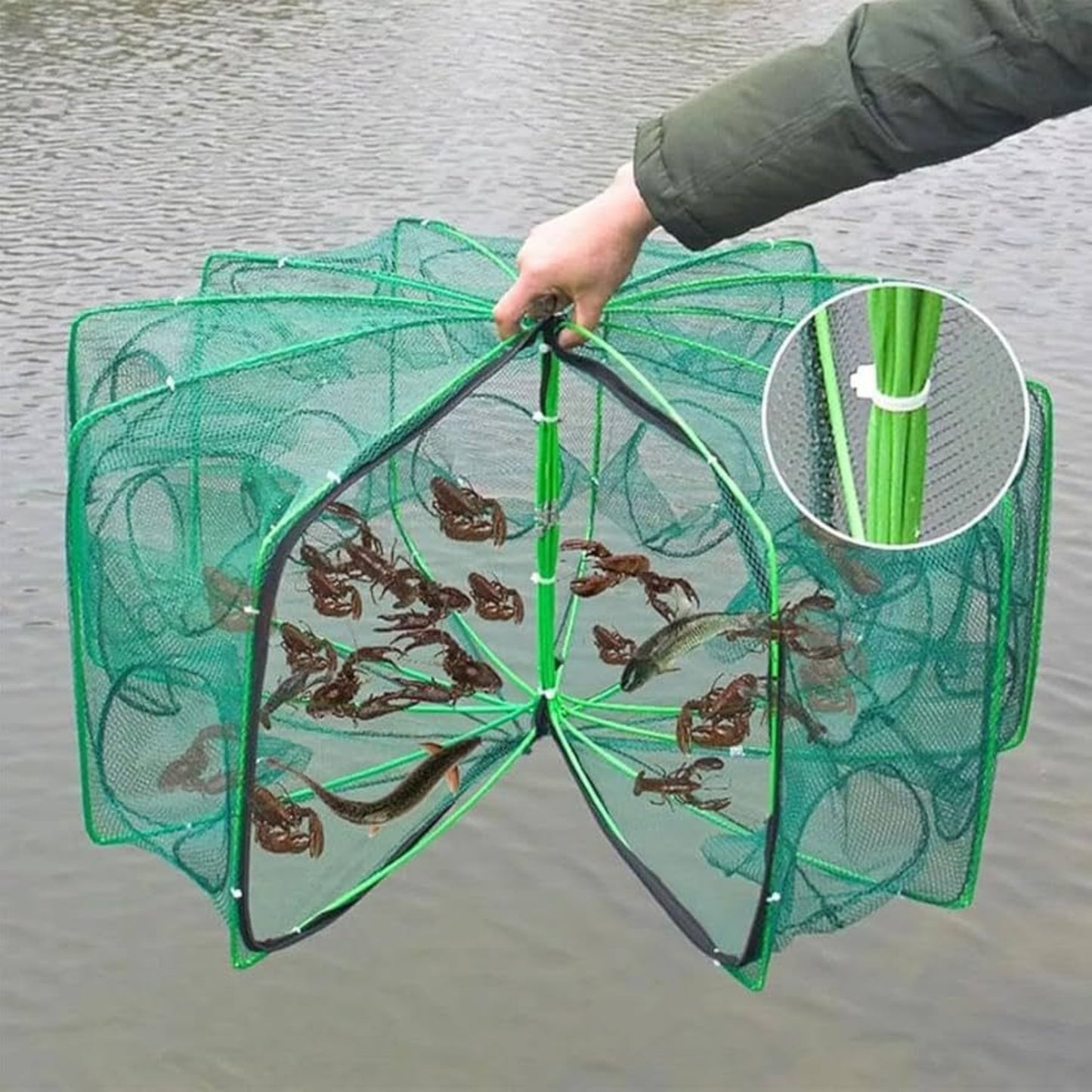 Fishing trap net lifted from water showing live catch of crabs and fish inside durable mesh cage.